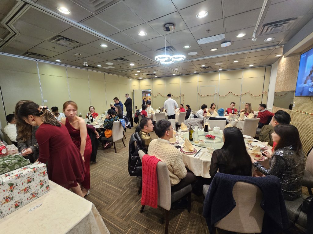 The banquet room filled with tables at the 2023 Christmas party