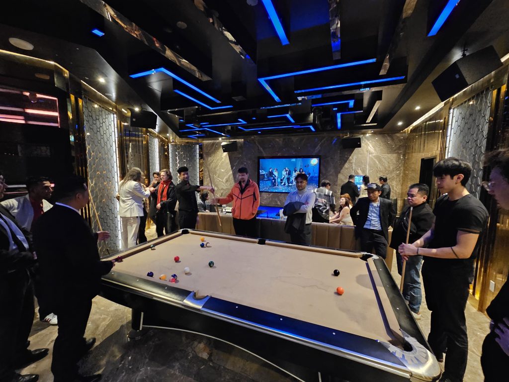 A game of pool in the after-party lounge